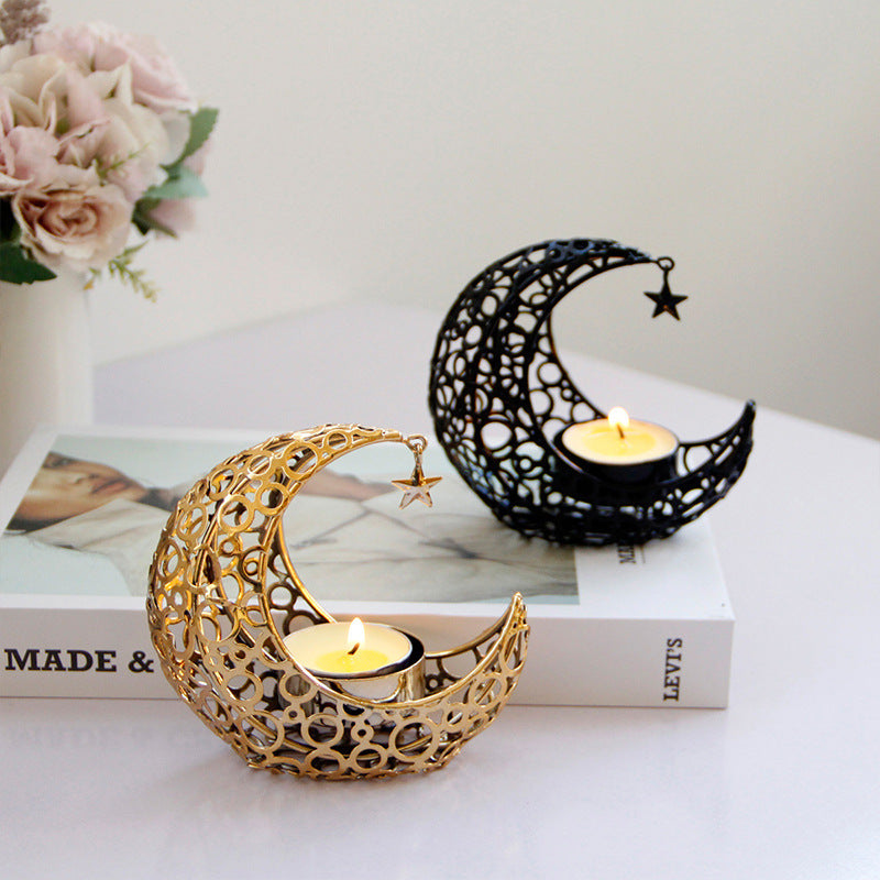 Modern crescent moon candle holder in black and gold metal