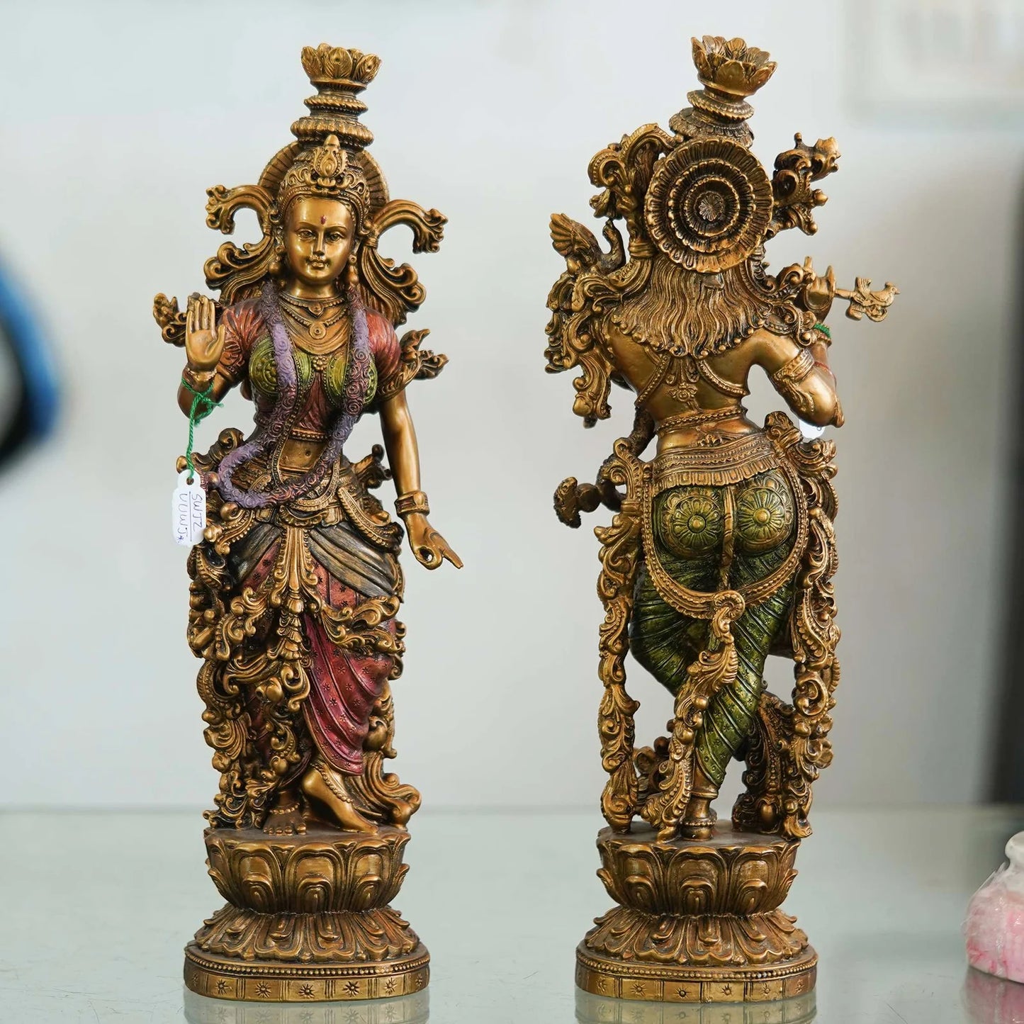 Intricately designed brass Radha-Krishna idol set with antique finish, ideal for home décor, temples, and festive gifting
