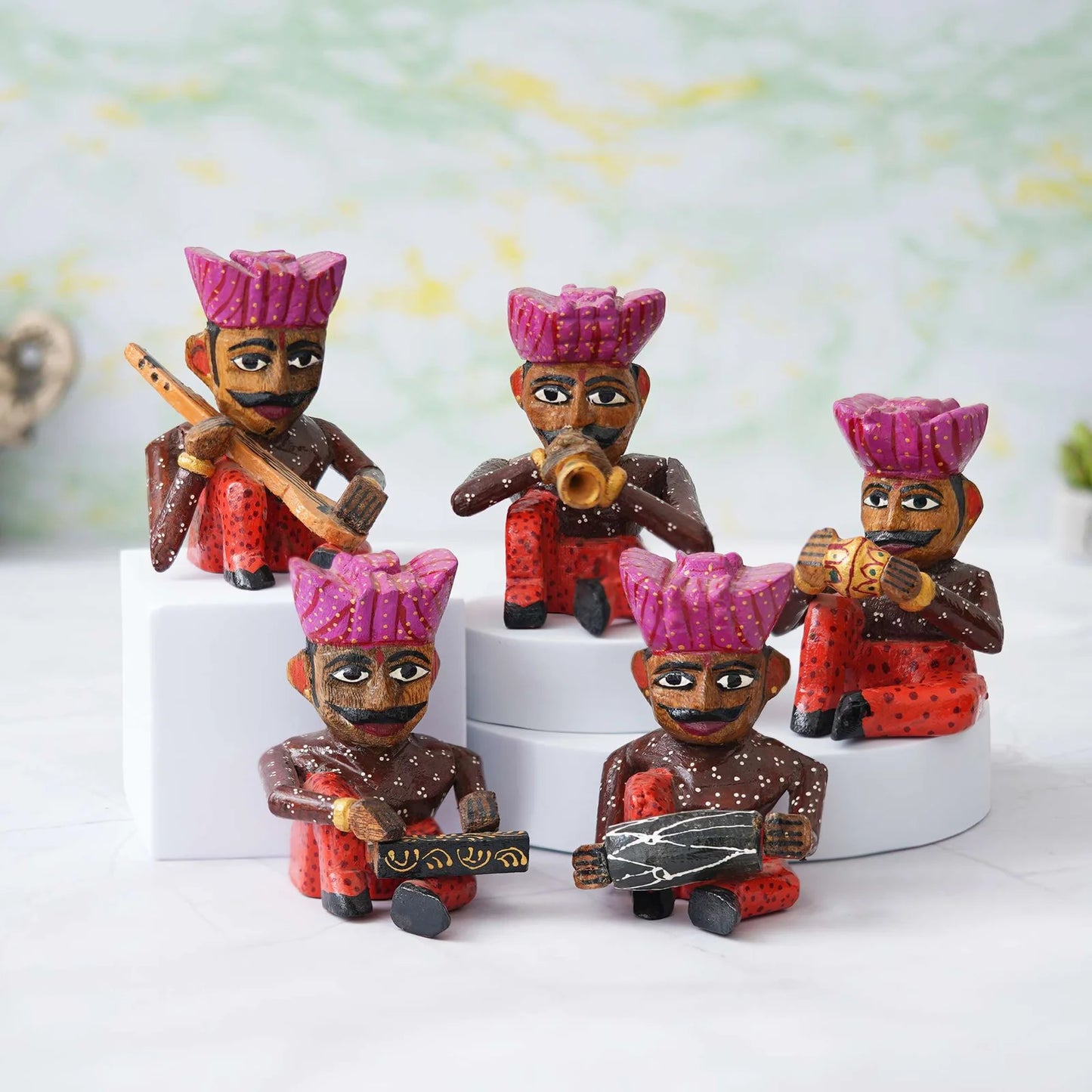 Handcrafted Rajasthani wooden musician figurines set in traditional attire with colorful turbans and musical instruments