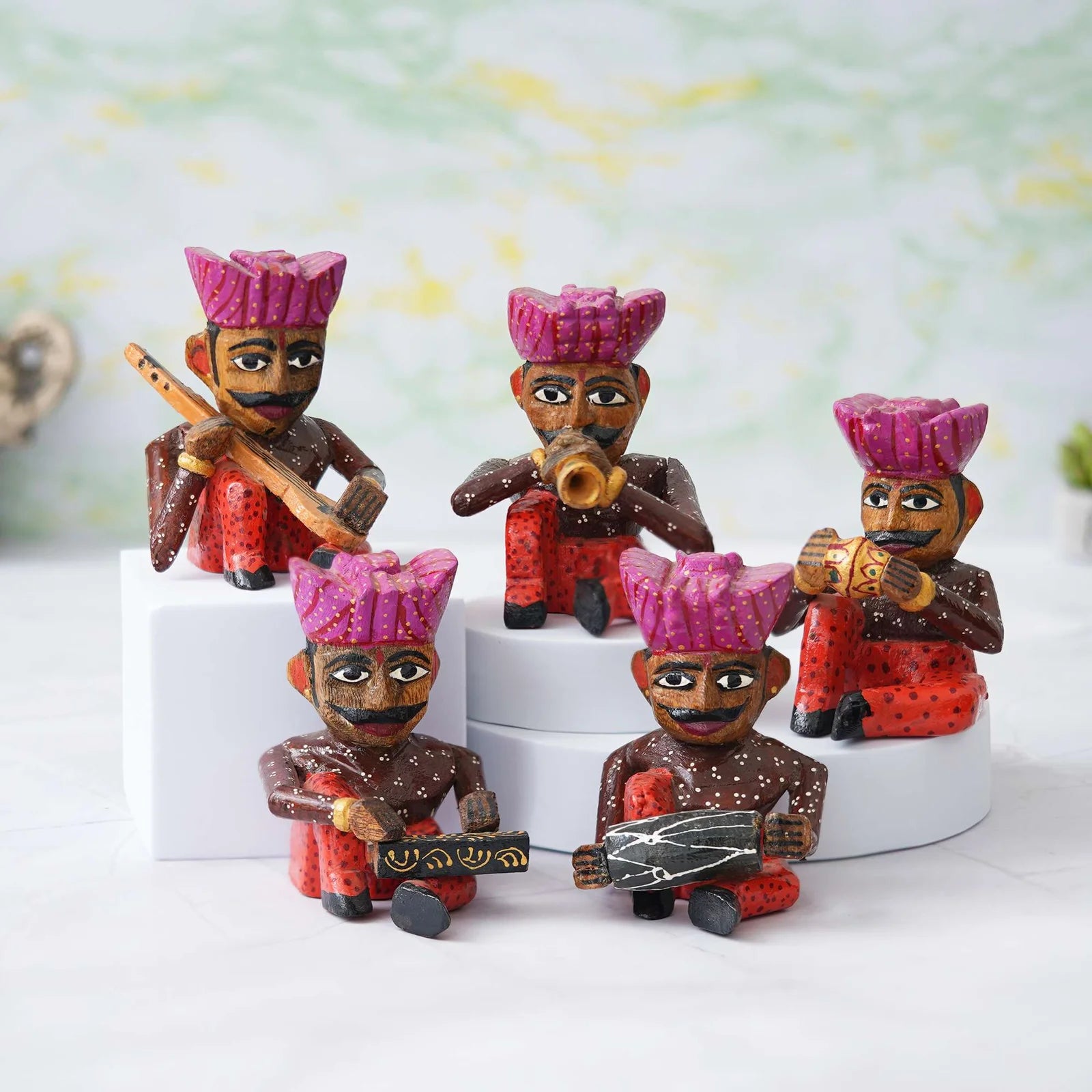 Handcrafted Rajasthani wooden musician figurines set in traditional attire with colorful turbans and musical instruments