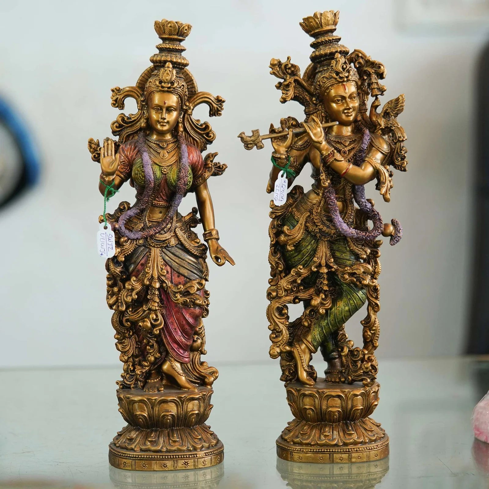 Intricately designed brass Radha-Krishna idol set with antique finish, ideal for home décor, temples, and festive gifting